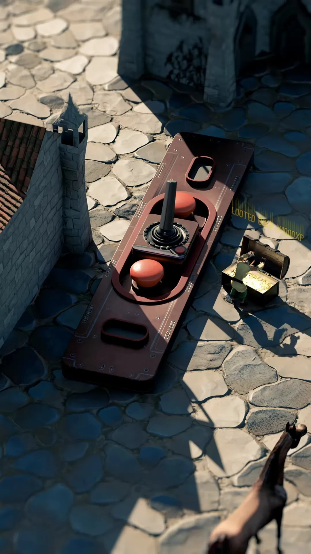 The arcade controller among sand and rocks in a third game genre.