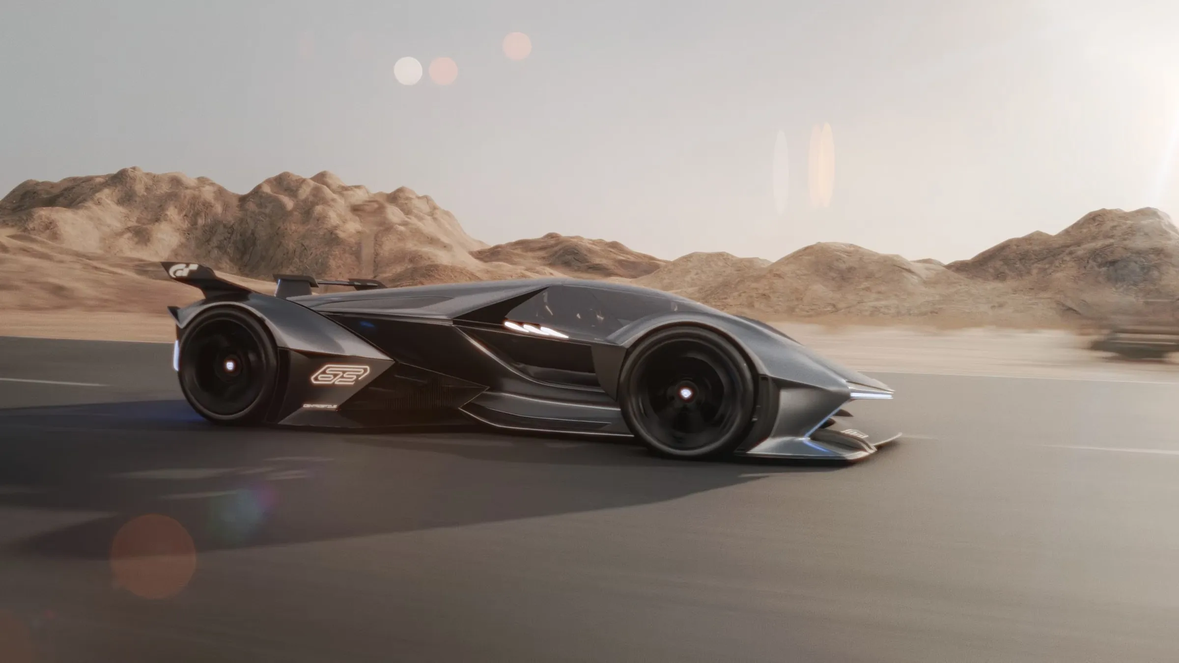 Side view of the Lamborghini V12 Vision GT speeding past desert dunes and rocks.